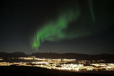 Scenic view of sea against sky at night