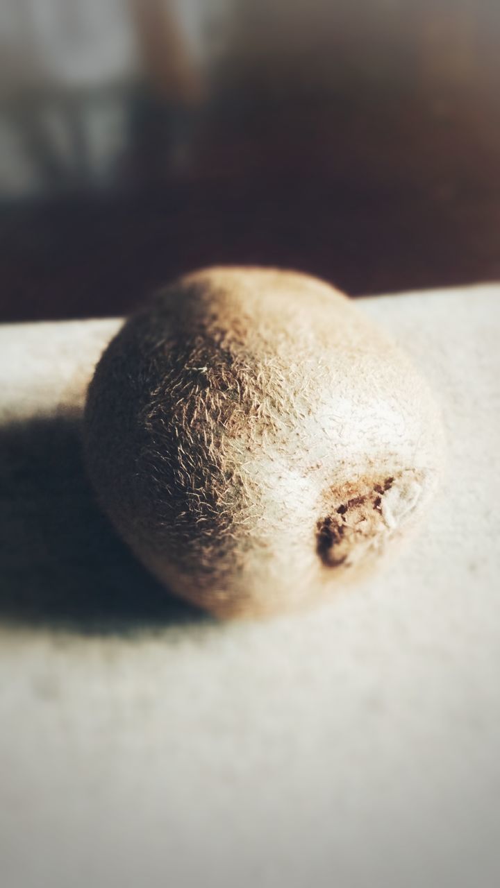 HIGH ANGLE VIEW OF BREAD ON WOODEN TABLE