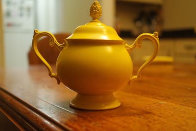 Close-up of yellow table