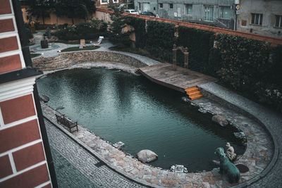 High angle view of bridge over canal in city