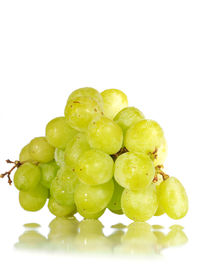 Close-up of fruit over white background