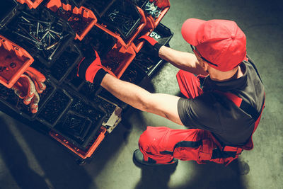 High angle view of man working at workshop