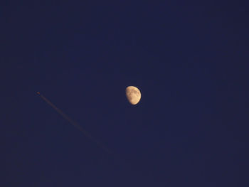 Low angle view of moon in sky