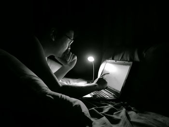 Close-up of hand holding illuminated light