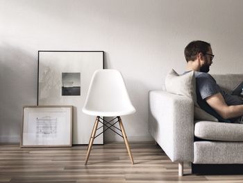 Two people sitting on chair