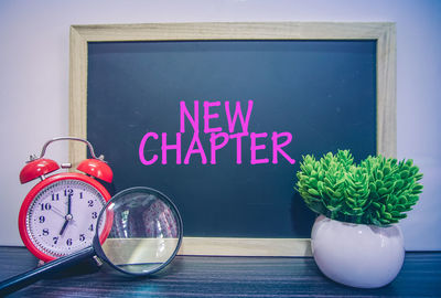 Close-up of text on table