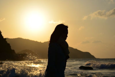 Scenic view of sea at sunset