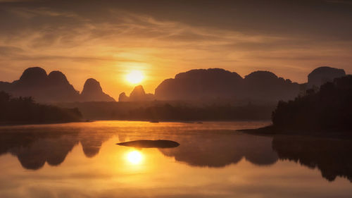 Scenic view of lake against sky during sunrise, nong thale, krabi