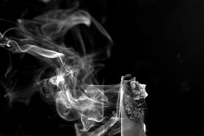 Close-up of smoke against black background