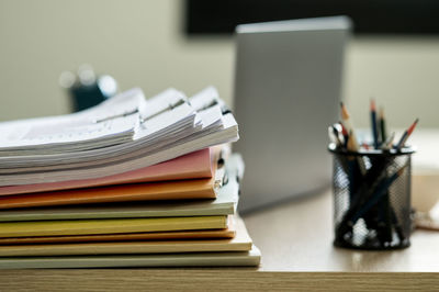 Stack of books on table