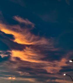 Low angle view of dramatic sky during sunset