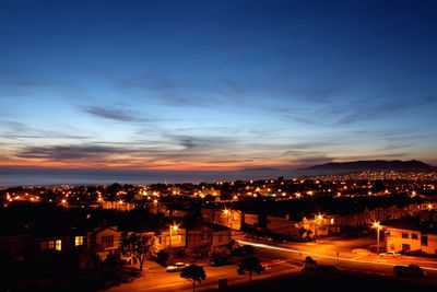 View of illuminated city at night