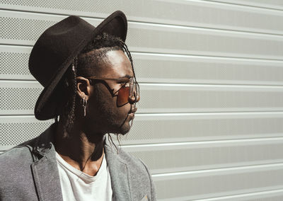 Portrait of young man looking away