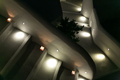 Low angle view of illuminated ceiling at home