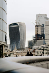 Low angle view of skyscrapers against clear sky