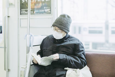 Man working on window