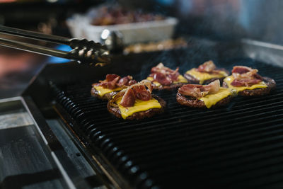 Close-up of meat on barbecue grill