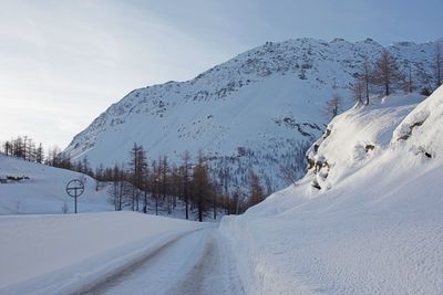 Snow covered mountain against sky