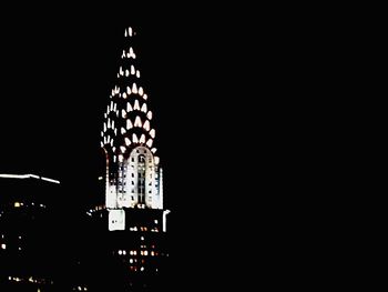 Low angle view of illuminated built structure