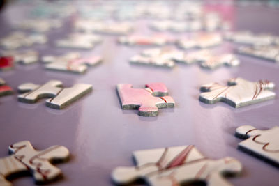 Close up of jigsaw puzzle pieces on table