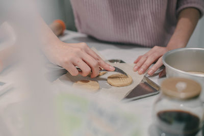 Close-up of woman baking