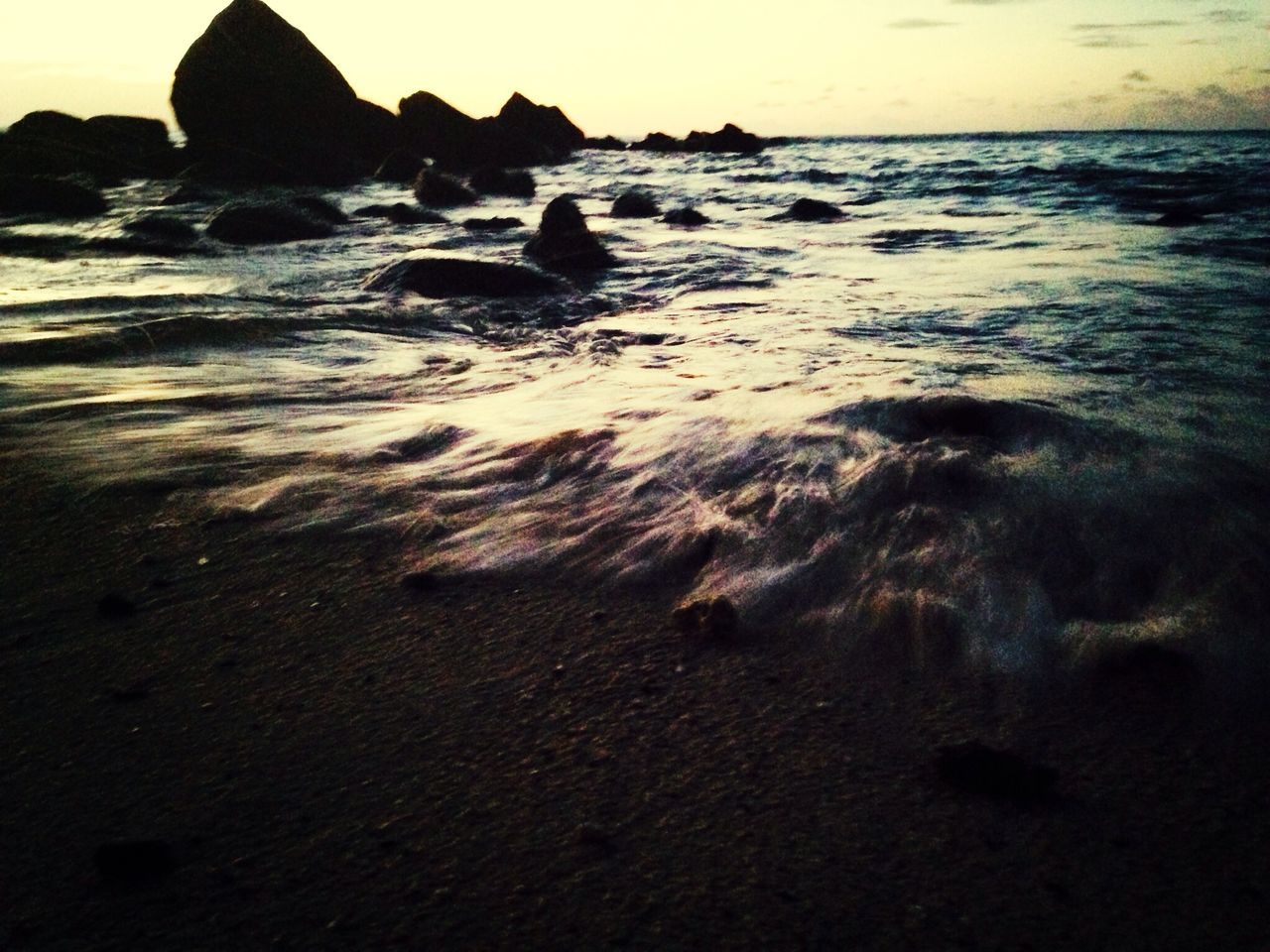 water, sea, scenics, tranquil scene, beauty in nature, tranquility, horizon over water, nature, wave, rock - object, beach, shore, idyllic, rock formation, sunset, rippled, sky, coastline, surf, seascape