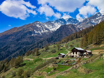 Scenic view of landscape and mountains against sky