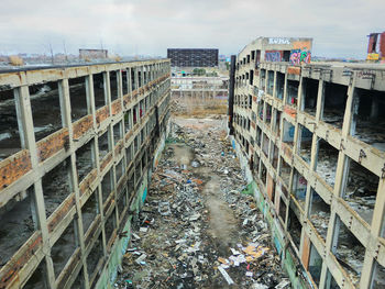 Panoramic view of abandoned building against sky