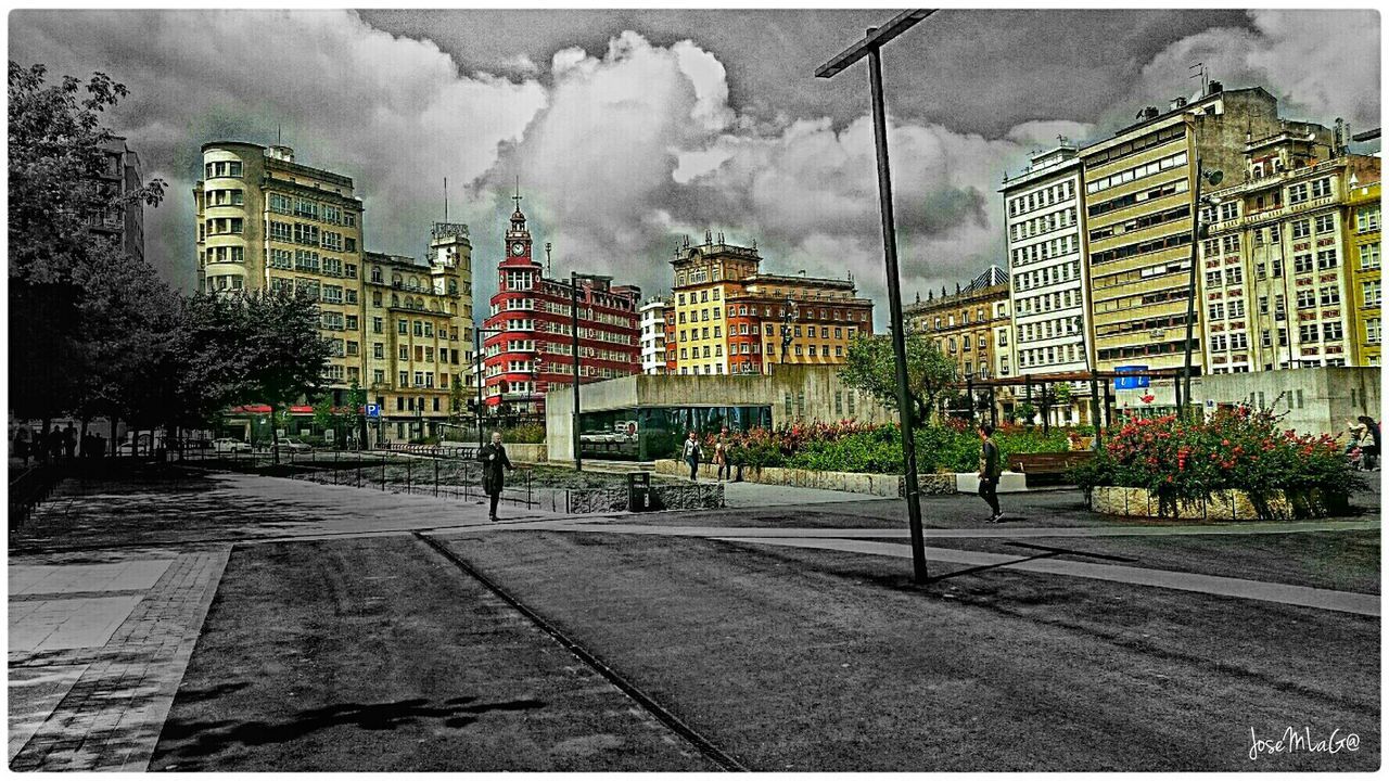 building exterior, architecture, built structure, transfer print, city, sky, cloud - sky, auto post production filter, street, cloudy, building, transportation, road, city life, residential structure, residential building, city street, the way forward, cloud, outdoors