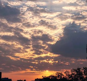 Scenic view of dramatic sky during sunset