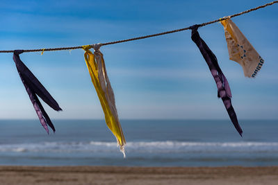 Low angle view of woman standing on beach