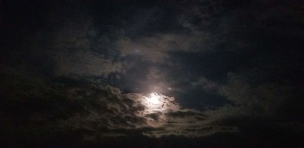 Low angle view of clouds in sky at night