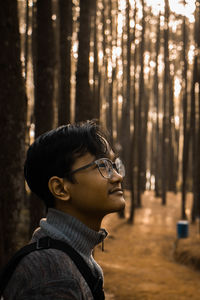 Portrait of teenage girl in forest