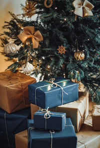 Christmas presents in front of tree