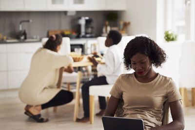 Family working and doing chores at home