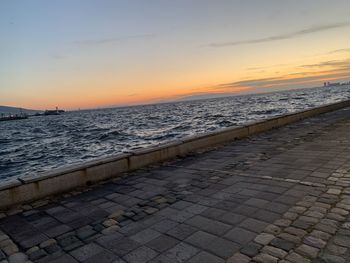 Scenic view of sea against sky during sunset