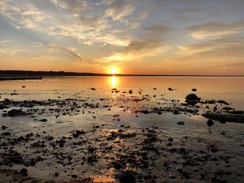 Scenic view of sea against sky during sunset