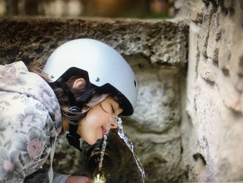 Portrait of woman drinking