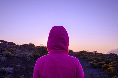 Woman standing in the dark