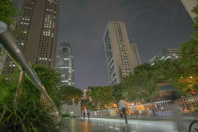 Woman walking on city street