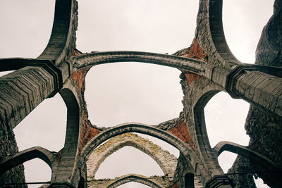 Low angle view of old ruin against sky