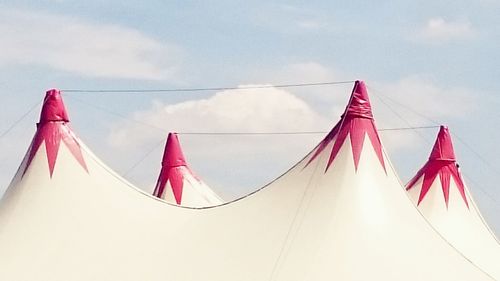 Low angle view of clothes hanging in row