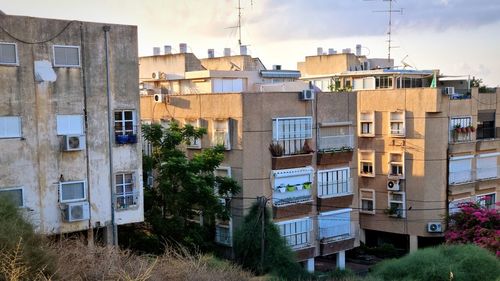 High angle view of residential buildings against sky