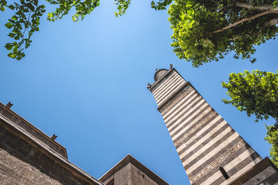 Low angle view of building against clear blue sky