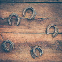 Close-up of text on old wooden door