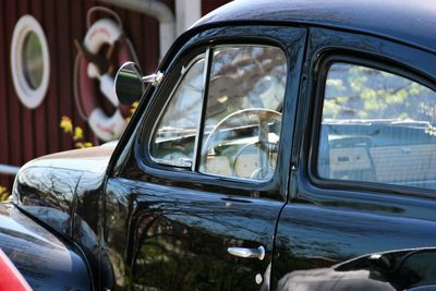 Close-up of car side-view mirror