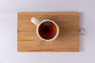 Directly above shot of coffee cup on table