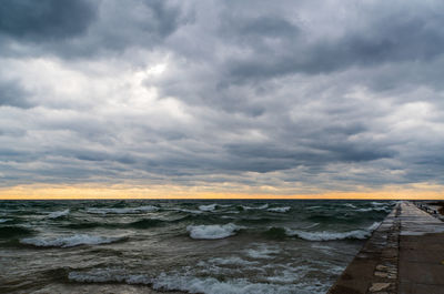 Scenic view of sea against sky during sunset