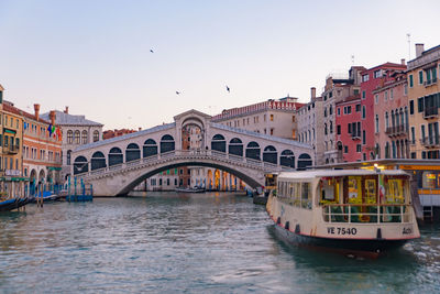 View of bridge over river in city