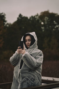 Young woman using mobile phone